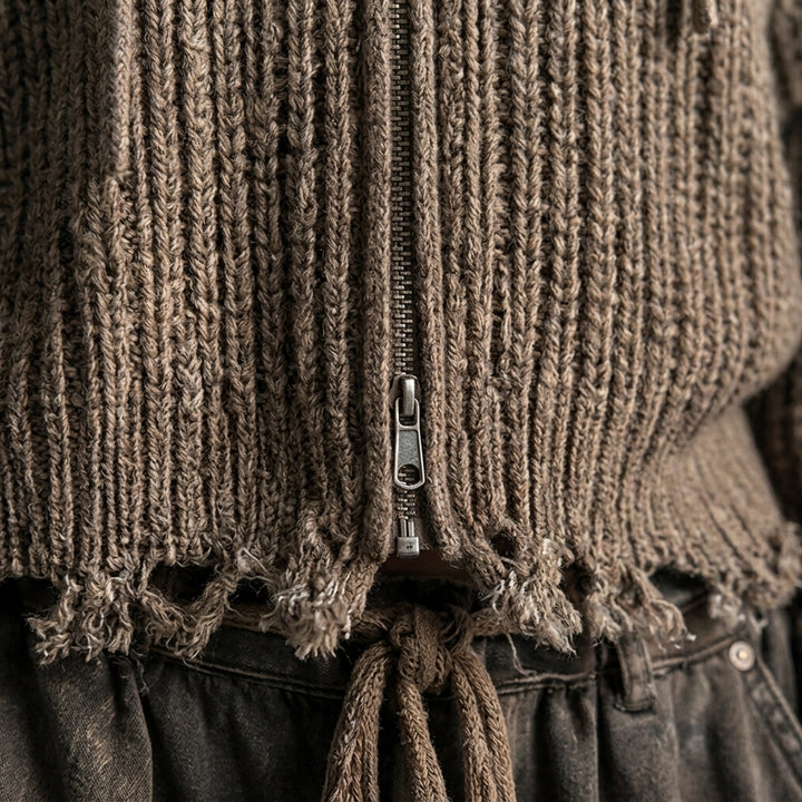 Junko – Gros plan texture grosse maille et zip métallique